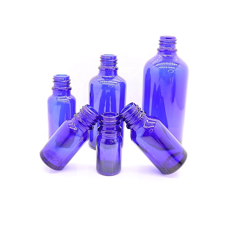 Empty essential oil bottle with round paper box amber glass bottle glass bottle with dropper cap wholesale 5-100ml