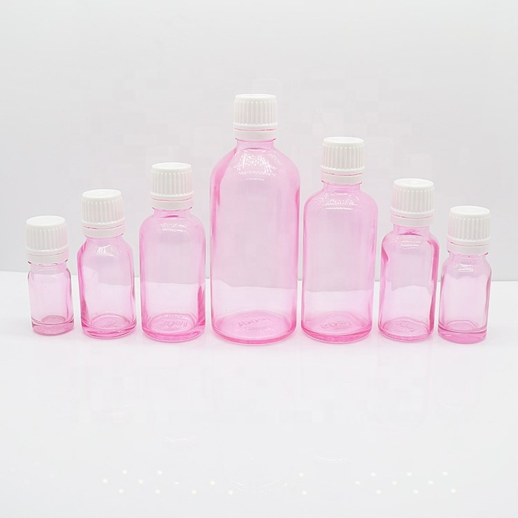 Empty essential oil bottle with round paper box amber glass bottle glass bottle with dropper cap wholesale 5-100ml