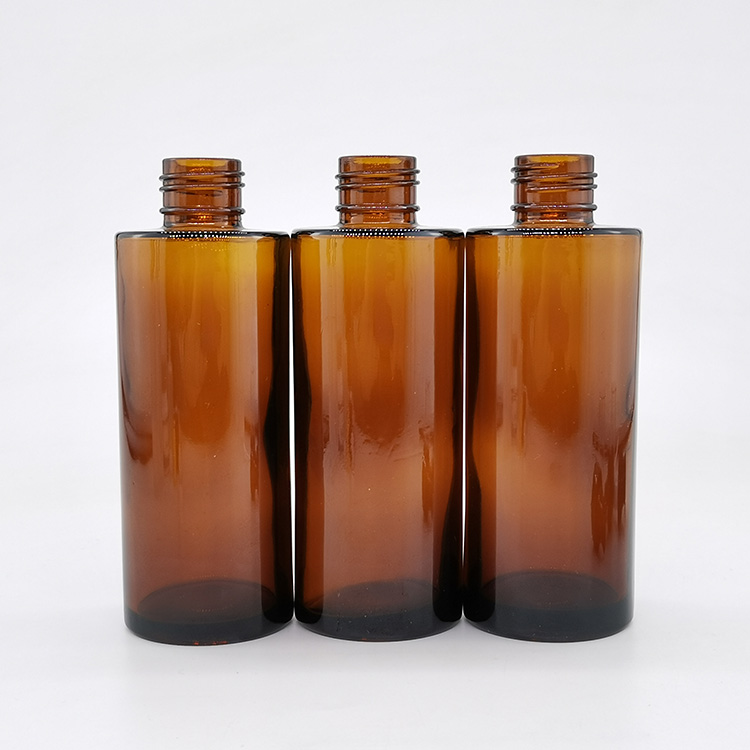 Empty flat shoulder mist spray serum pump bottle amber glass bottles with black pump