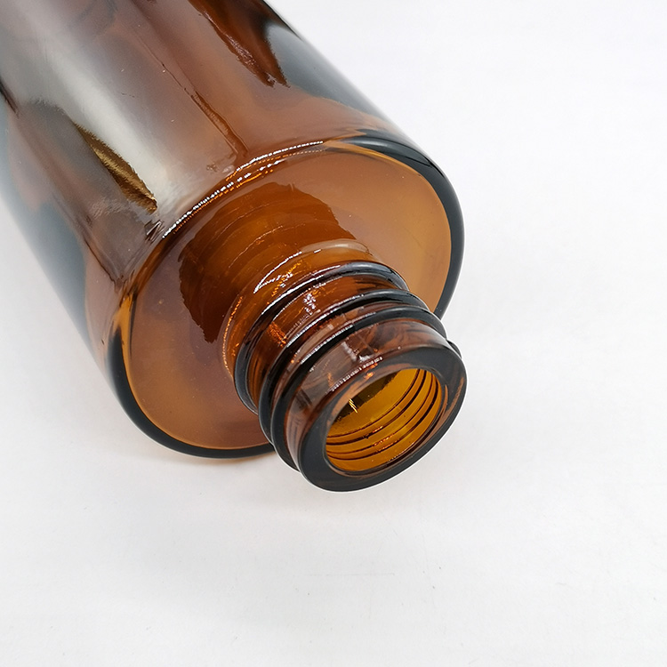Empty flat shoulder mist spray serum pump bottle amber glass bottles with black pump
