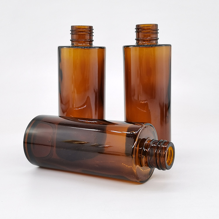 Empty flat shoulder mist spray serum pump bottle amber glass bottles with black pump