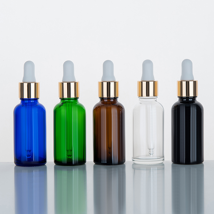 Empty frosted amber glass dropper bottle