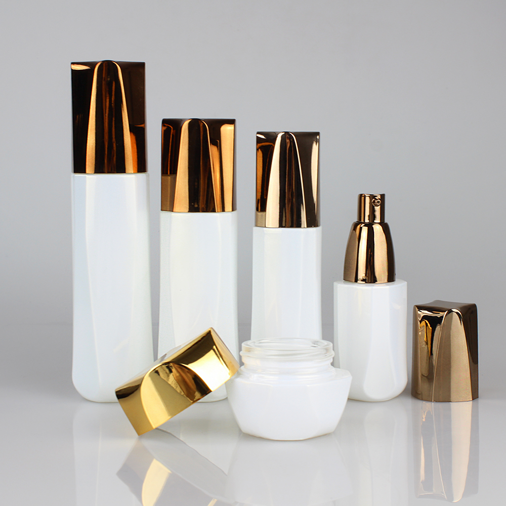 Empty glass cosmetic packaging of 40ml 60ml 100ml 120ml lotion pump bottle and the white cream jar in 30g with gold lid