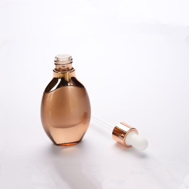 Empty gold color 30ml Custom luxury essential oil bottle essence oil glass bottle