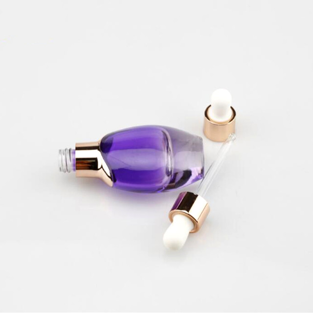 Empty gold color 30ml Custom luxury essential oil bottle essence oil glass bottle