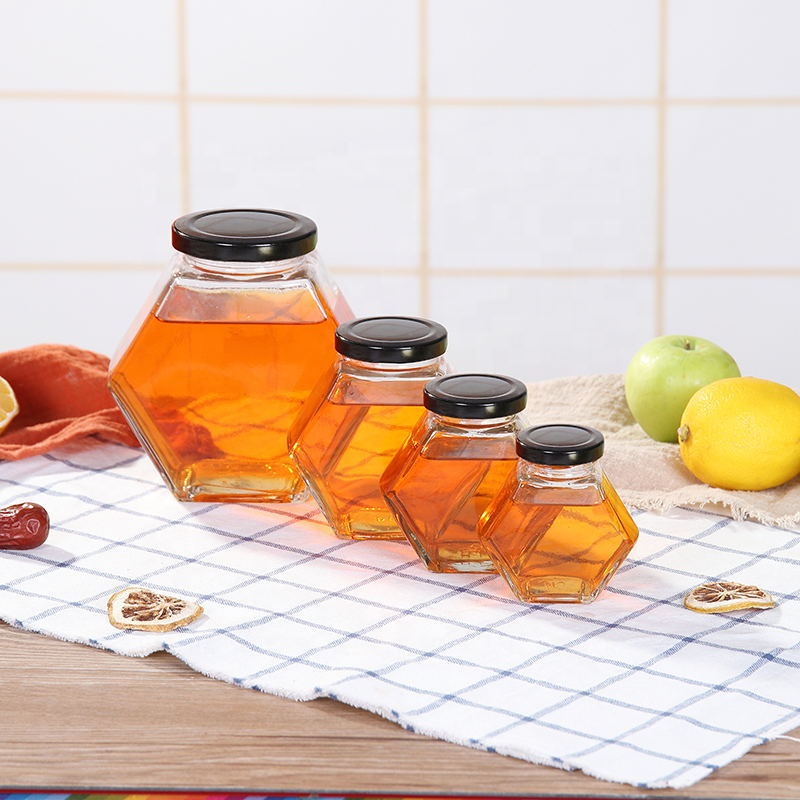 Empty hexagonal glass jar with lid for honey 100ml 180ml 280ml 380ml