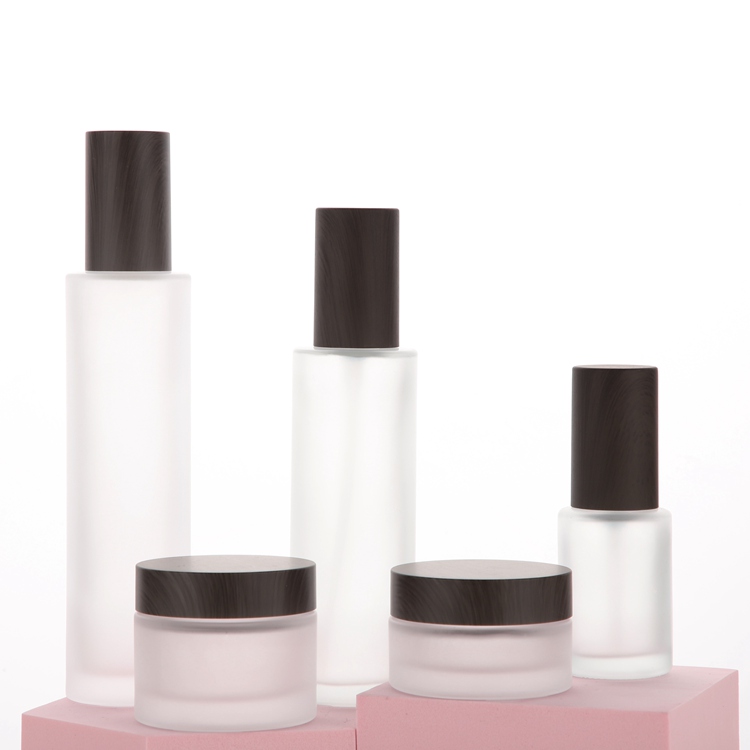 Empty matte clear glass cosmetic set packaging in 30ml 100ml 120ml lotion pump bottle  and 30ml 50ml cream jar