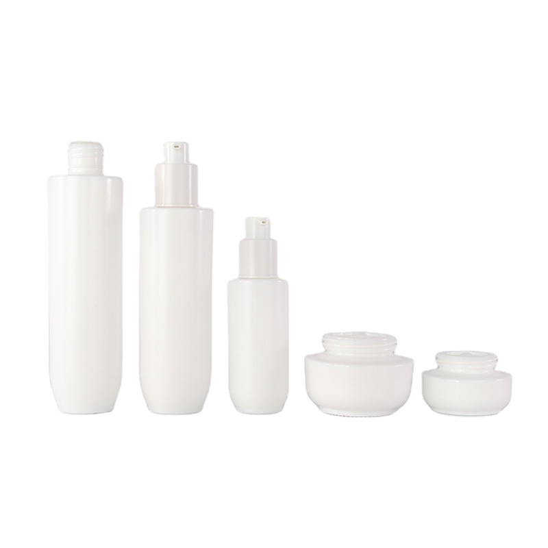 Empty opal white glass cosmetic pump lotion bottle and ceramic cream jar