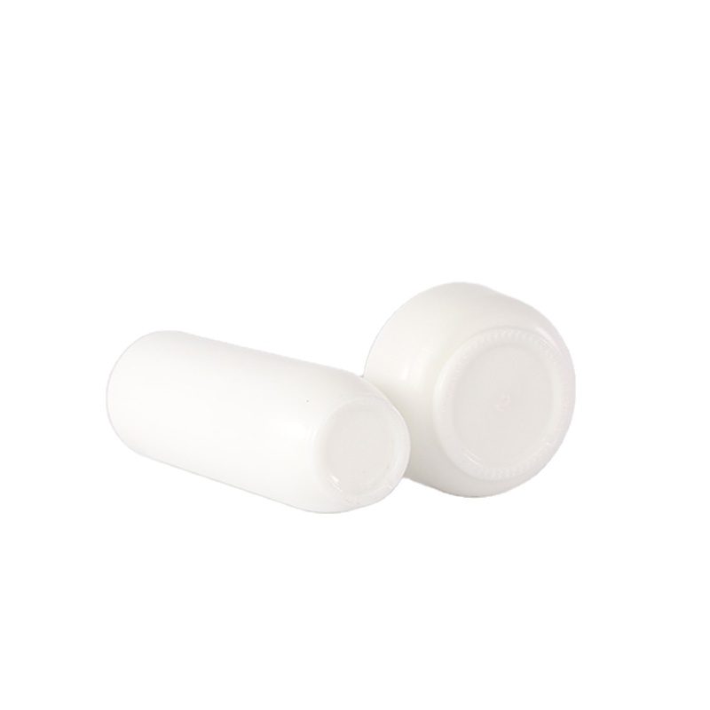 Empty opal white glass cosmetic pump lotion bottle and ceramic cream jar