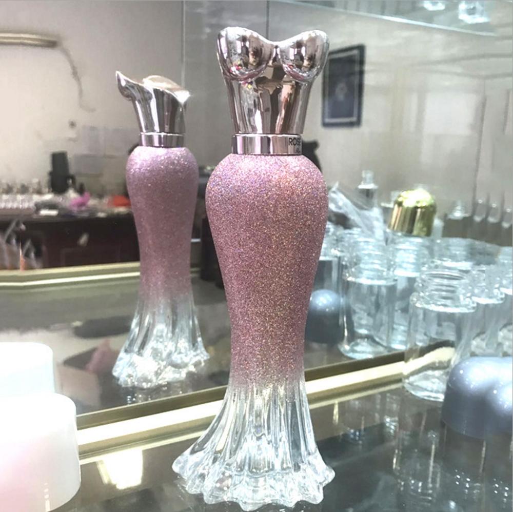 Empty pink color woman body shape perfume glass bottle 100ml