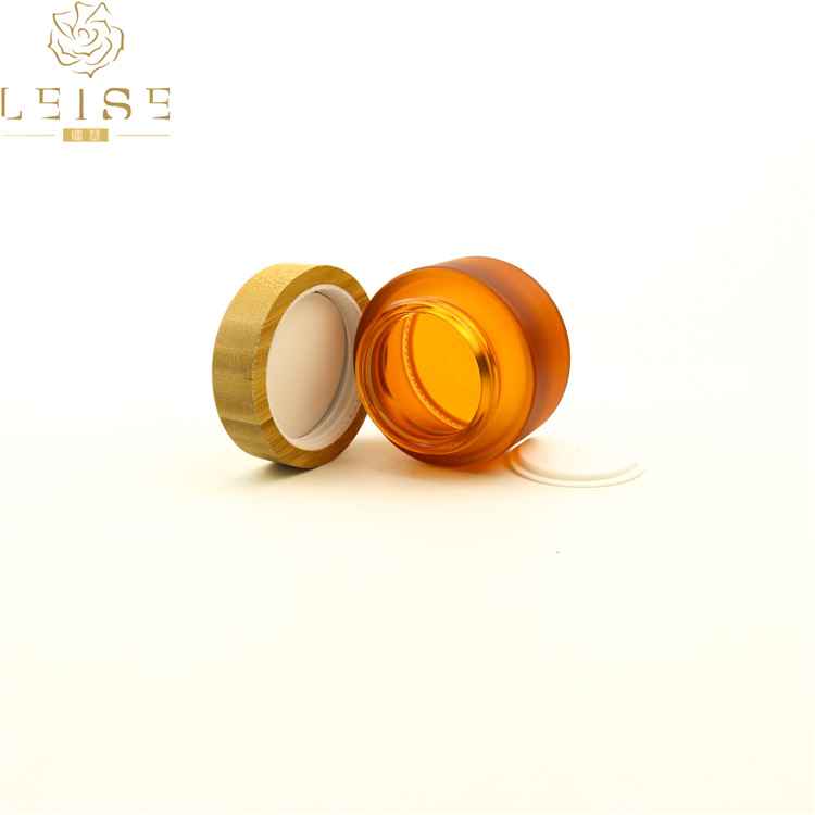 Empty recycled 15g, 30g, 50g, 100g Glass jar cosmetics packaging bamboo lid face cream container glass cream jar with bamboo cap