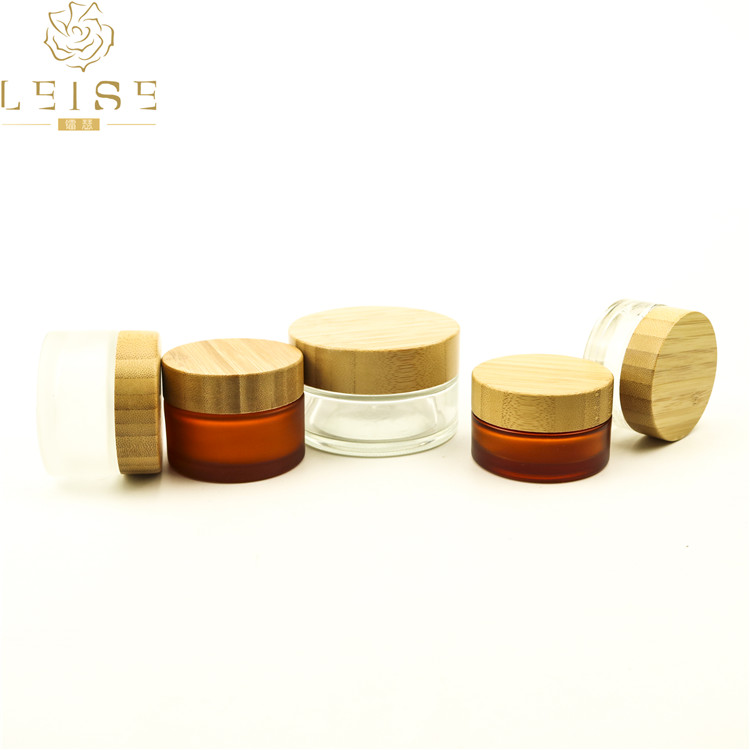 Empty recycled 15g, 30g, 50g, 100g Glass jar cosmetics packaging bamboo lid face cream container glass cream jar with bamboo cap