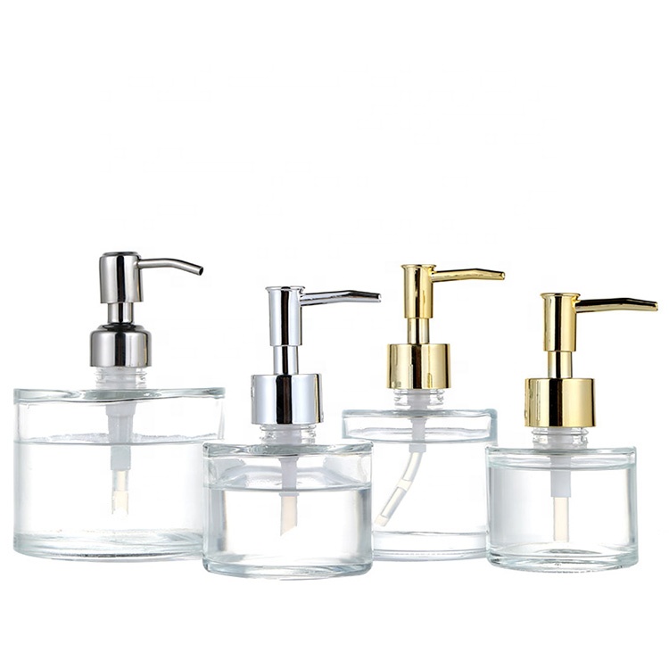 Empty round glass liquid bottle with Stainless steel pump for hand soap