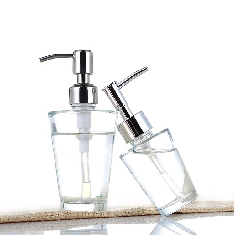 Empty round glass liquid bottle with Stainless steel pump for hand soap
