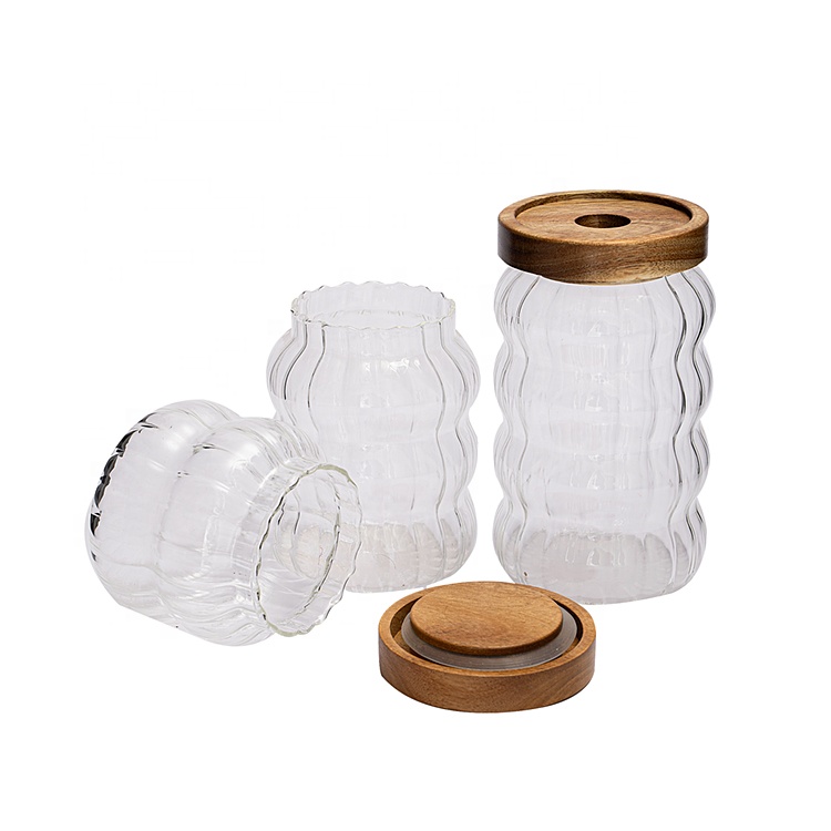 Empty stylish striped borosilicate glass storage jar