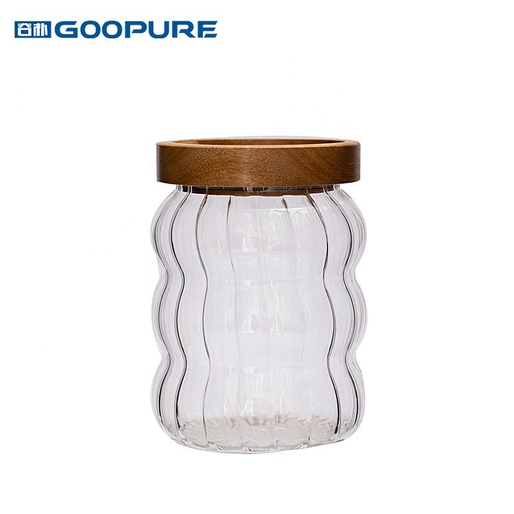 Empty stylish striped borosilicate glass storage jar