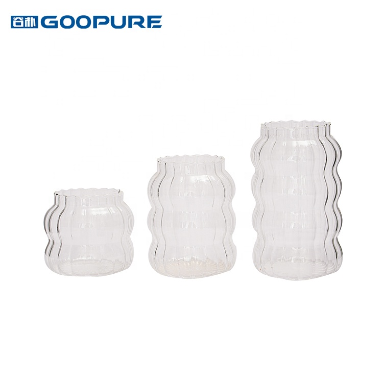 Empty stylish striped borosilicate glass storage jar
