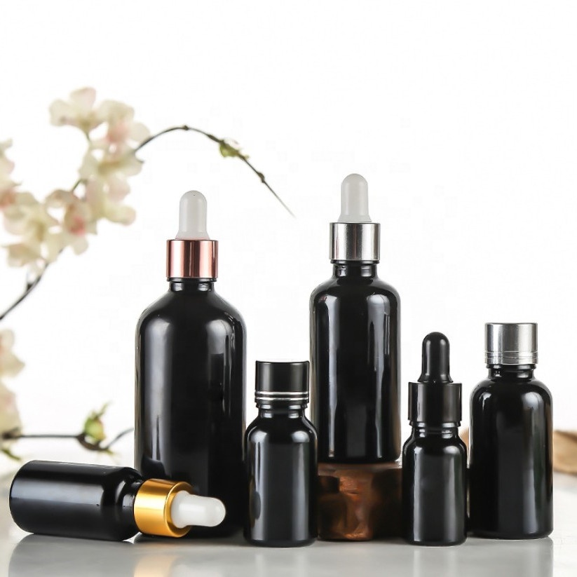 Empty wholesale hair oil cosmetic serum packaging 30ml 50ml 100ml parfum matt black glass spray bottle