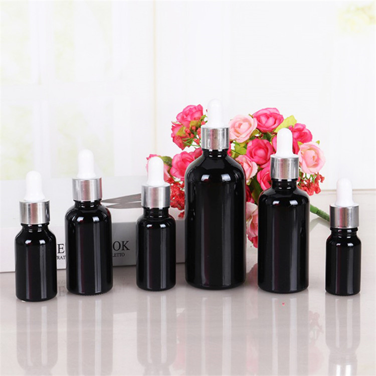 Empty wholesale hair oil cosmetic serum packaging 30ml 50ml 100ml parfum matt black glass spray bottle