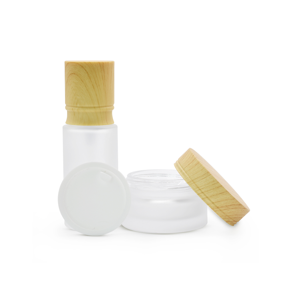 Emulsion glass bottle frosted flat shoulder with white pump jar with bamboo grain cover cosmetic set