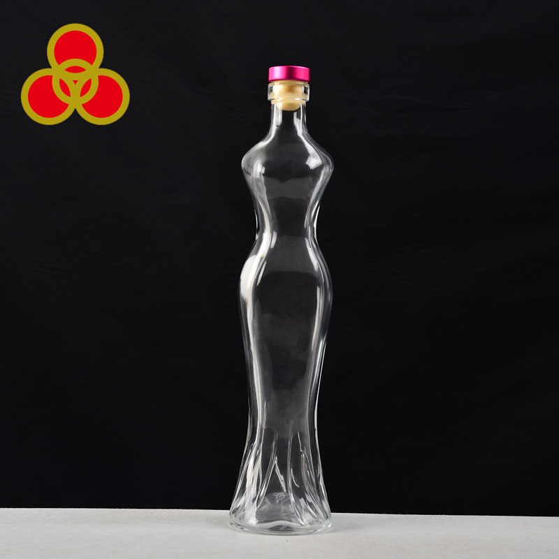 Engraved clear women body shaped glass empty liquor bottle