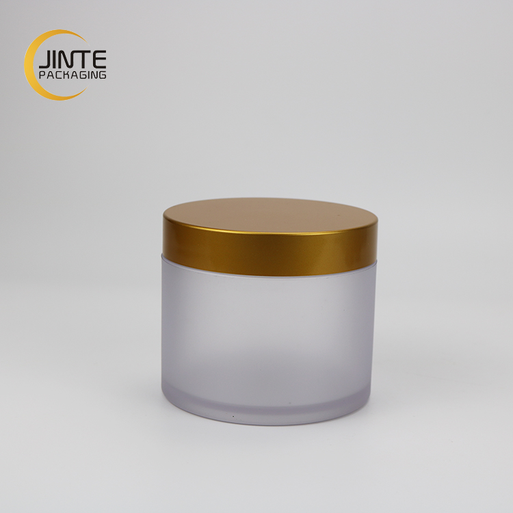 Environment friendly Empty cosmetic pot with painted gold cap silver cap clear jar packaging