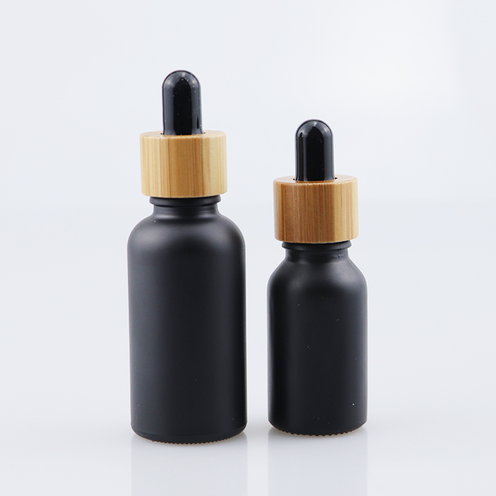 Environmental bamboo lid bamboo cap glass cosmetic glass bottle 10ml 30ml 60ml 100ml black glass oil bottles