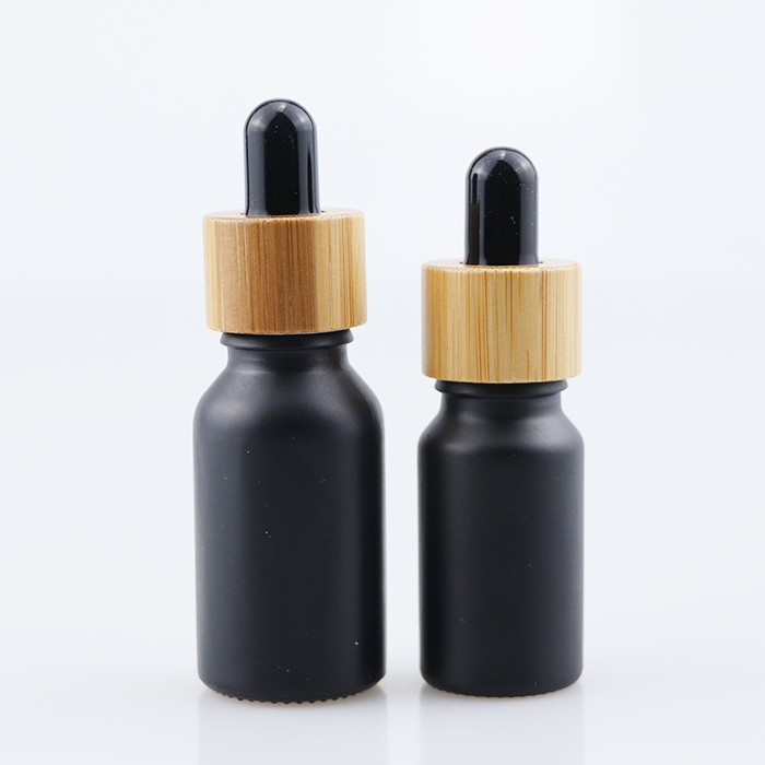 Environmental bamboo lid bamboo cap glass cosmetic glass bottle 10ml 30ml 60ml 100ml black glass oil bottles