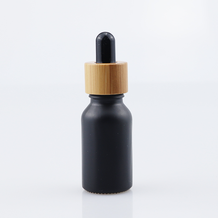 Environmental bamboo lid bamboo cap glass cosmetic glass bottle 10ml 30ml 60ml 100ml black glass oil bottles