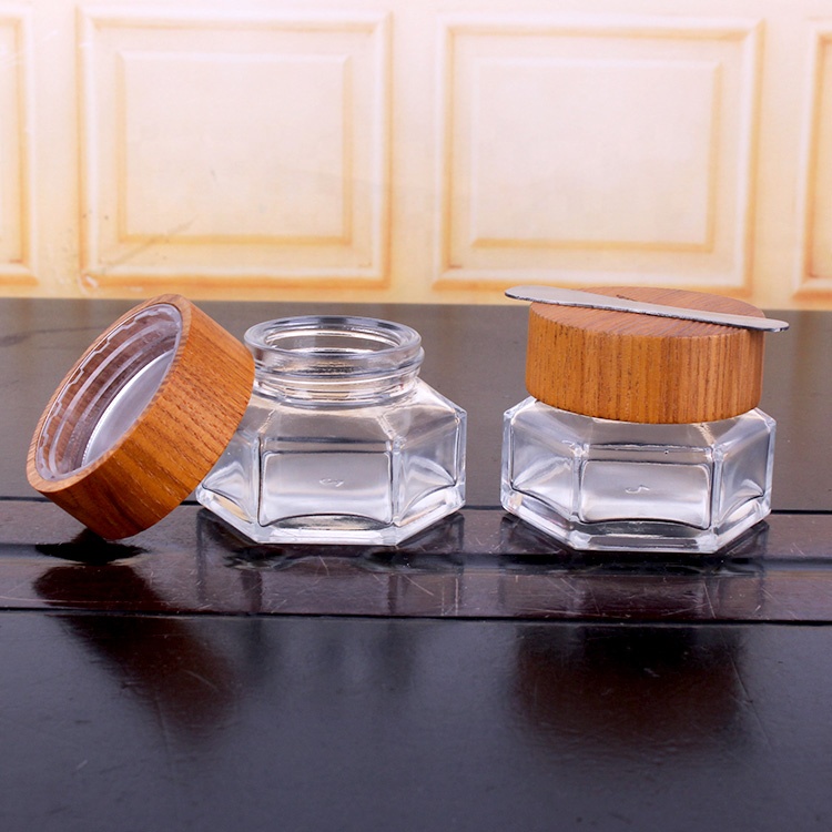 Environmental hexagonal 50ml clear glass cream packaging jars for cosmetics with spoon bamboo lid