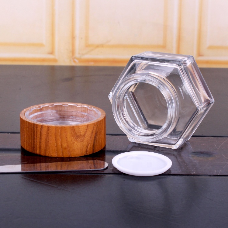 Environmental hexagonal 50ml clear glass cream packaging jars for cosmetics with spoon bamboo lid
