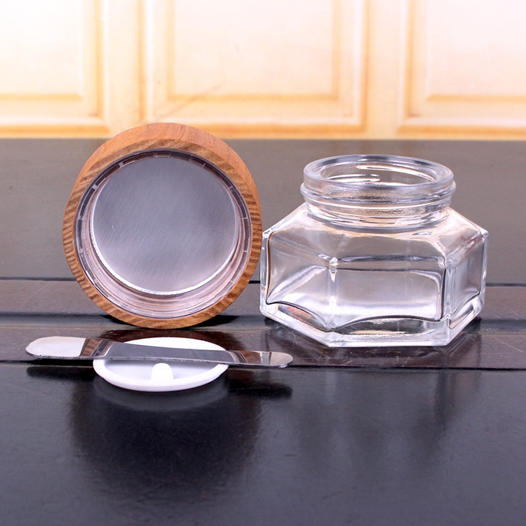 Environmental hexagonal 50ml clear glass cream packaging jars for cosmetics with spoon bamboo lid