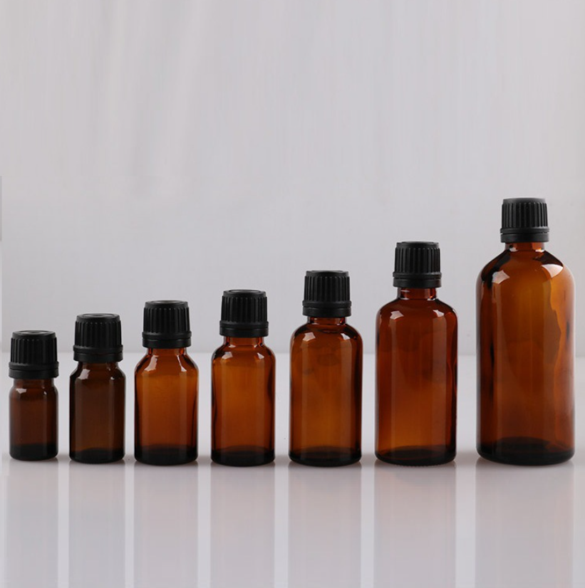 Essential Oil Packaging Wholesale 10ml 15ml 20ml Clear Amber Glass Bottle With Childproof Cap