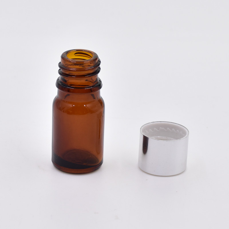 Essential Oil Use Round Amber Custom Glass Material UV-proof 10ml glass bottle with pump cover