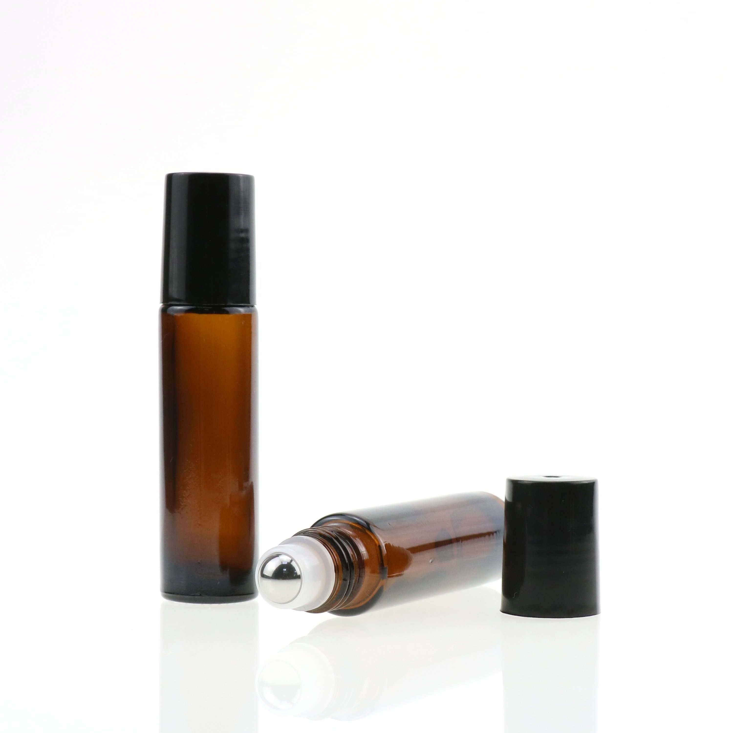 Essential oil 10 ml matte black amber roller bottle with metal roll on ball and black cap 10ml amber glass roll on bottle