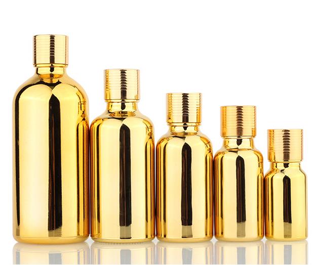 Essential oil bottle 50ml 100ml  sets glass bottle with  gold spray dropper cap empty cosmetic cuticle oil bottle