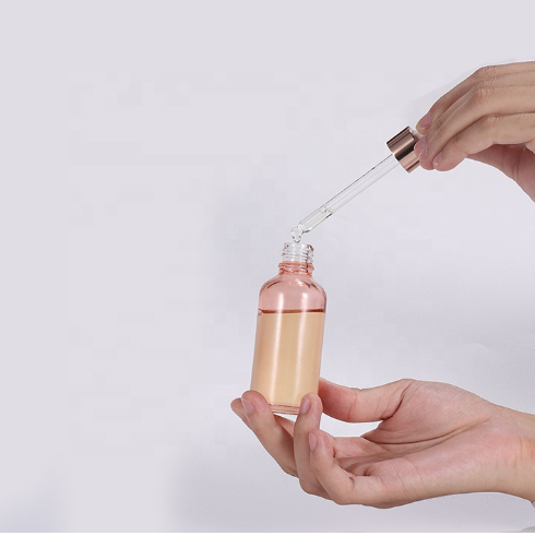 Essential oil empty 10ml 20ml 30ml 50ml 100ml custom translucent rose gold glass dropper bottle