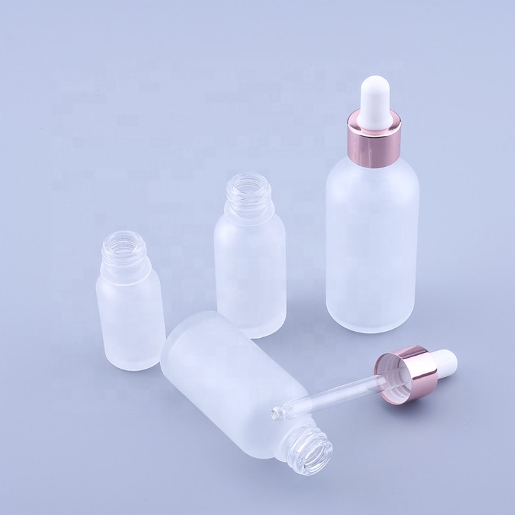 Essential oil empty 5ml 10ml 20ml 30ml 50ml 100ml custom translucent rose gold glass dropper bottle