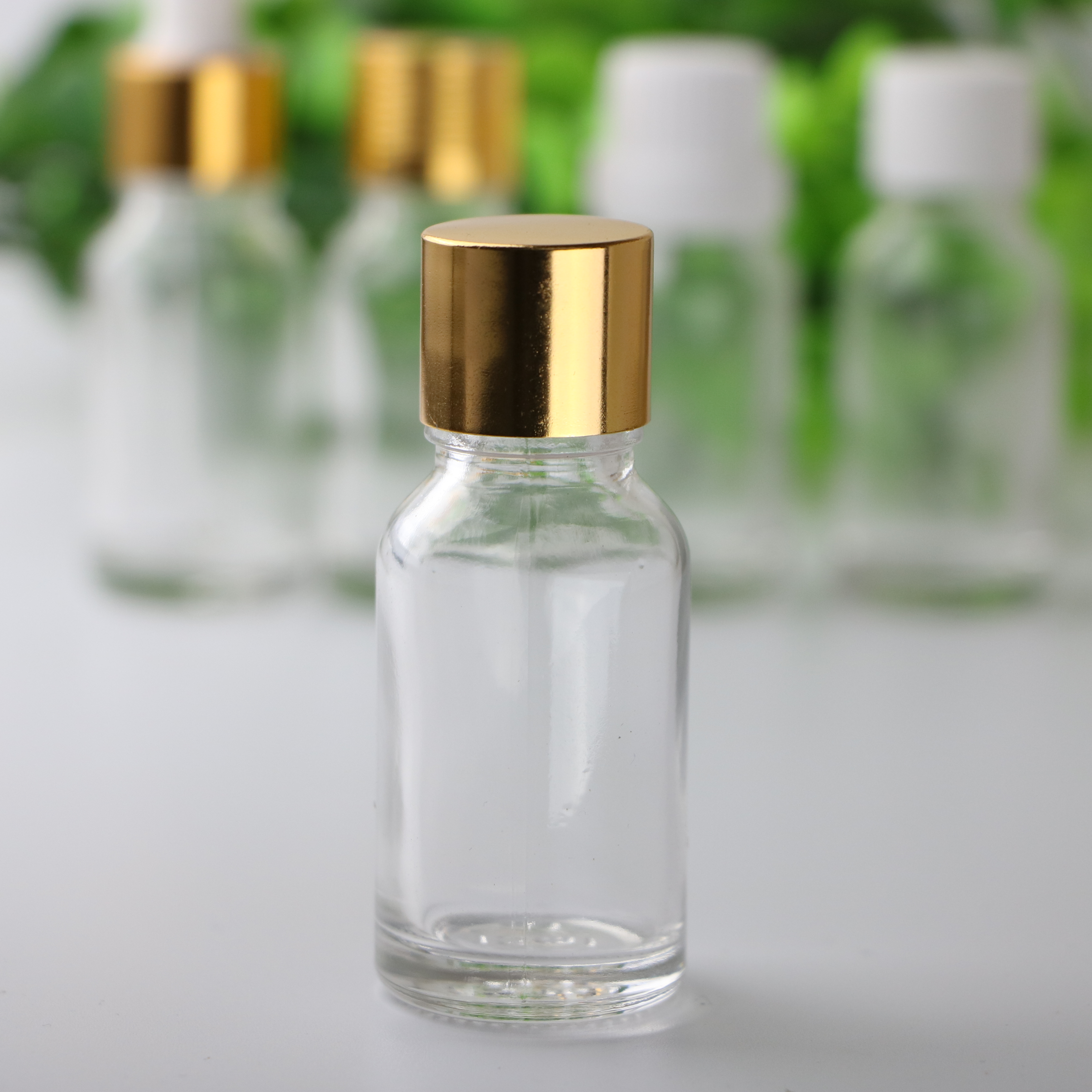 Essential oil packaging custom 5ml 10ml 15ml 20ml 30ml 50ml100ml clear green blue amber glass dropper bottle with childproof cap