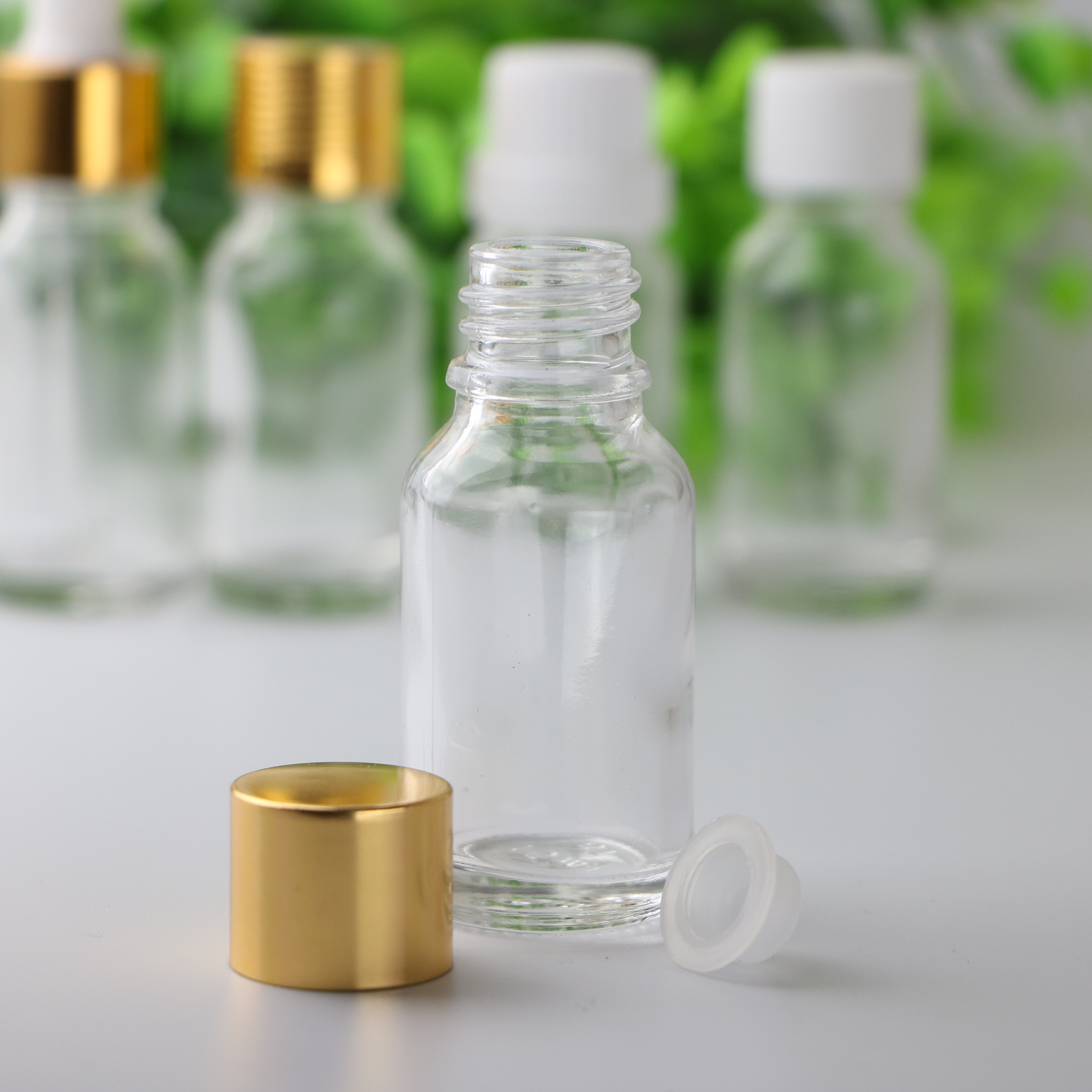 Essential oil packaging custom 5ml 10ml 15ml 20ml 30ml 50ml100ml clear green blue amber glass dropper bottle with childproof cap