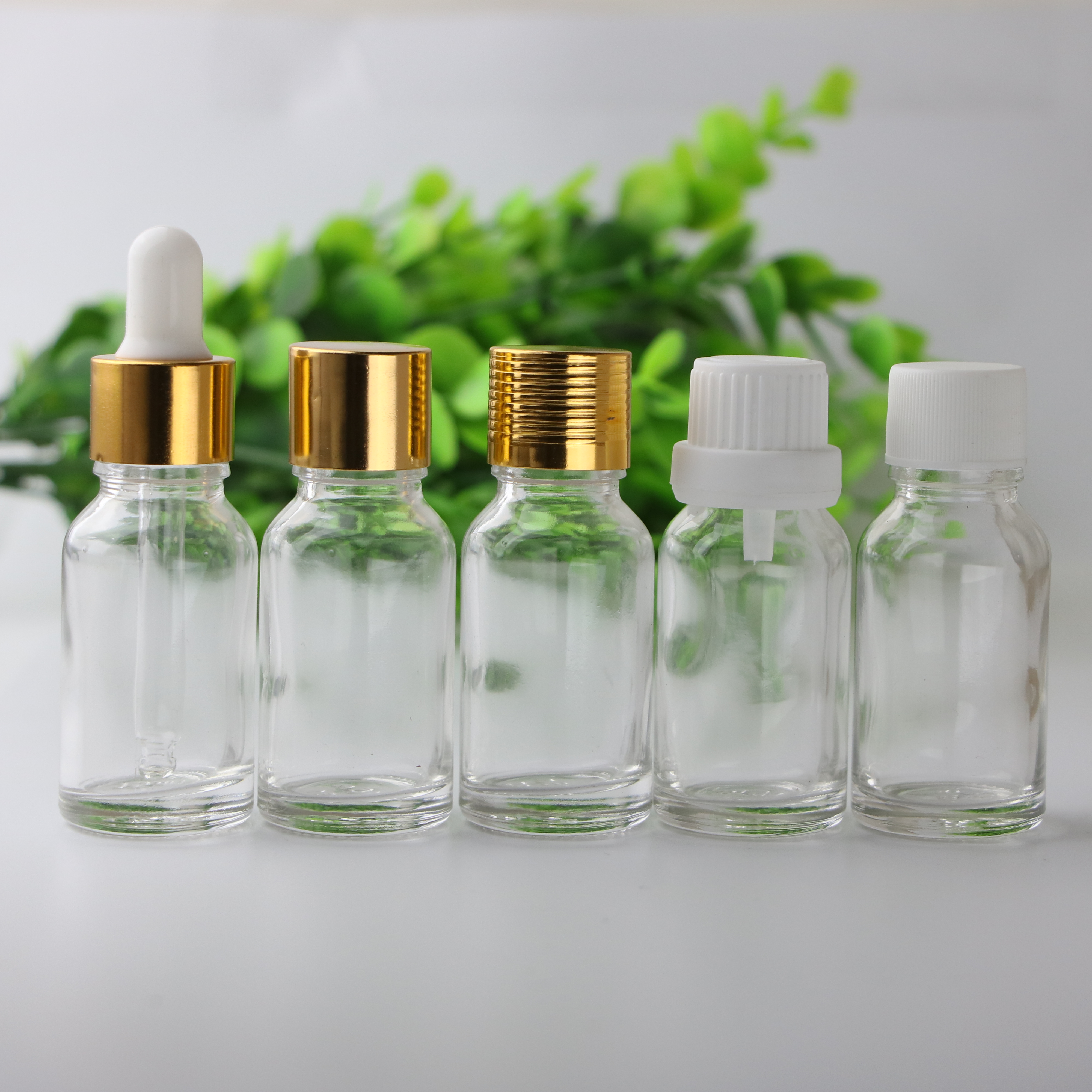 Essential oil packaging custom 5ml 10ml 15ml 20ml 30ml 50ml100ml clear green blue amber glass dropper bottle with childproof cap
