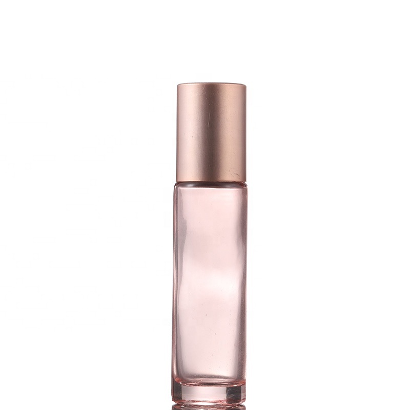 Essential oil use pink 10 ml eye cream glass roll on bottle with rose gold cap and metal stainless roll balls bottle tin
