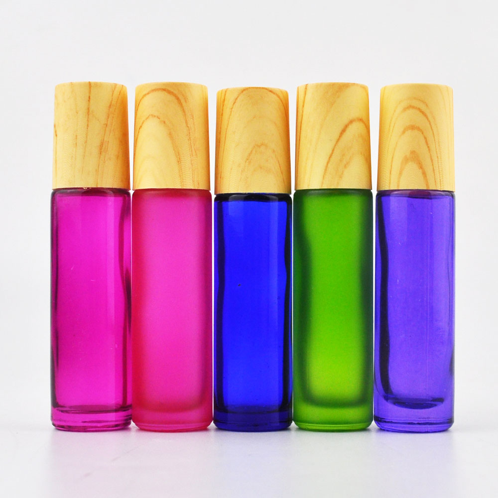 Essential oil use pink black colorful 5ml 10ml eye cream glass roll on bottle with bamboo lid and metal stainless roll balls
