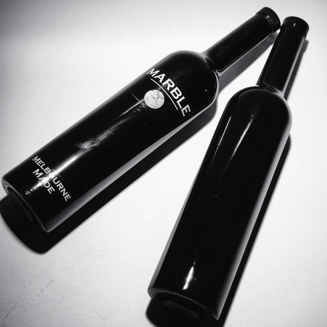 Excellent quality design exquisite emboss glass bottle vodka with Logo