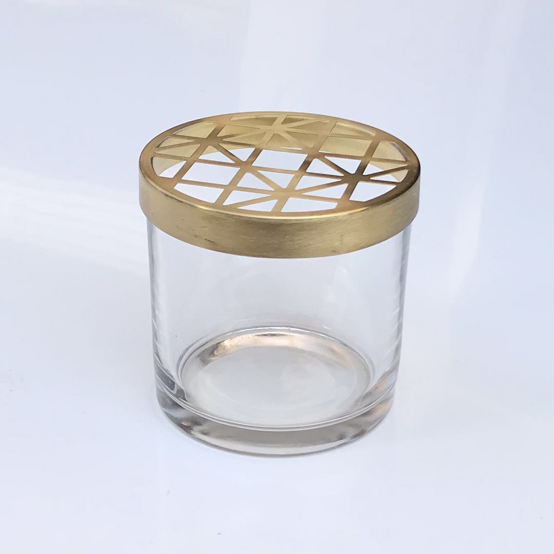 Exquisite gold clear black glass candle jar