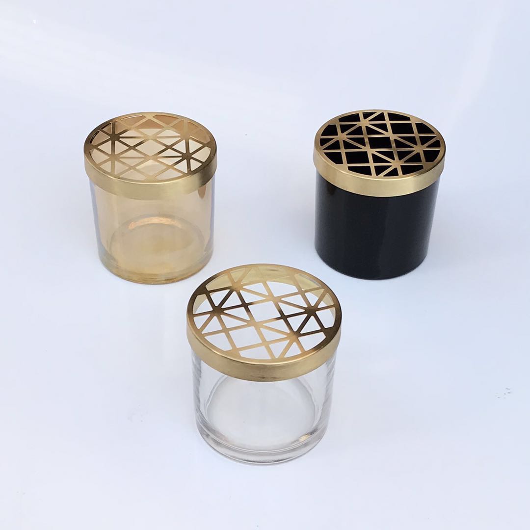 Exquisite gold clear black glass candle jar