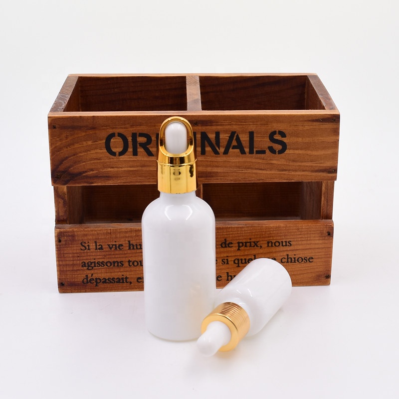 Factory 50ml white round essential oil serum frascos de vidri cbd oil glass jars and bottles with dropper spray pump cap