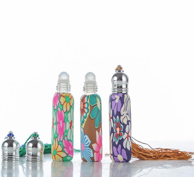 Factory Direct sales 10 ml Glass Roll-on Bottles with Stainless Steel Roller Balls Glass Roll on Perfume Bottles Flower Color