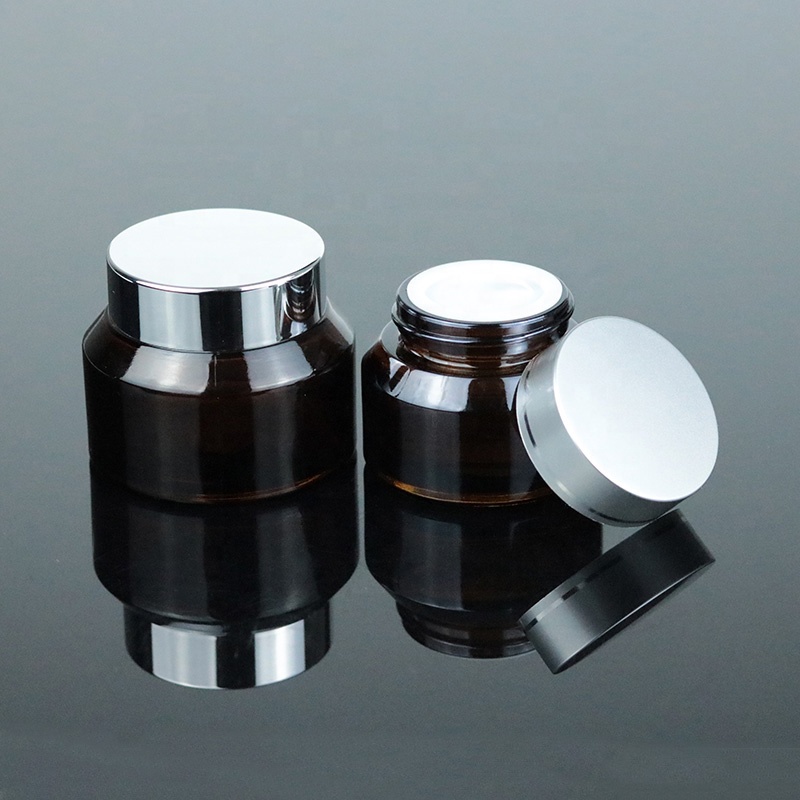 Factory Price 2 oz 60ml Clear Round Bottom Cosmetic Glass Jar with Black Lid (GJM45)