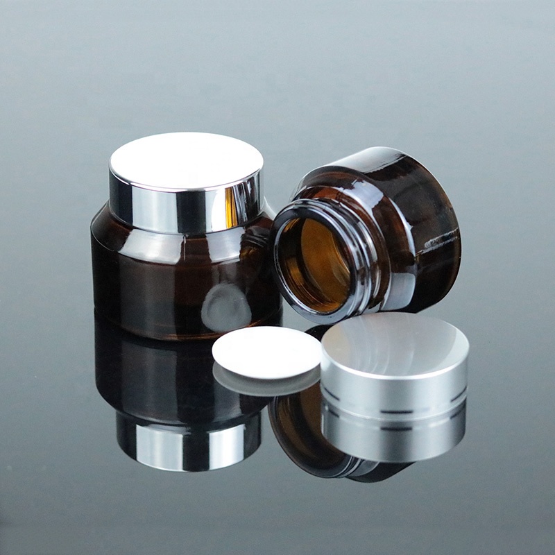 Factory Price 2 oz 60ml Clear Round Bottom Cosmetic Glass Jar with Black Lid (GJM45)